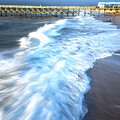 Waves Crashing Near Wooden Pier